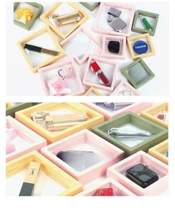 Detail view of square PE film suspension jewelry boxes in macaron colors and clear film