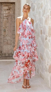 Detail of floral chiffon halter dress with layered ruffles and asymmetrical hem