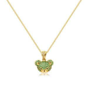Hip hop style gold necklace with full green rhinestone pavé bear pendant on white background