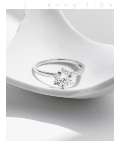 Detailed view of 1-carat moissanite ring with classic six-prong setting on S925 silver