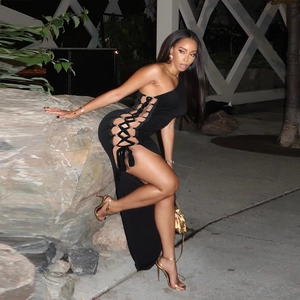 Sleek one-shoulder black bodycon dress featuring a sexy side cutout and high thigh slit