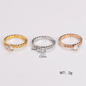 Honeycomb rings in gold, silver, and rose gold finishes with sparkling zircon stones