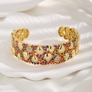 Luxury gold open bangle with multicolored zircon inlay and golden teardrop details