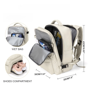 Detailed interior of beige travel backpack showing wet bag and shoe compartment
