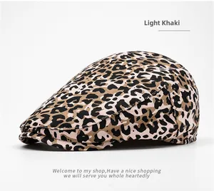 Detail of light khaki leopard print cotton flat cap with high-quality fabric texture