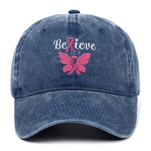 Navy blue denim baseball cap featuring pink breast cancer ribbon and Believe embroidery