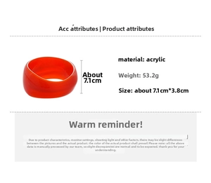 Orange acrylic geometric bangle showing dimensions of 7.1cm by 3.8cm and 53.2g weight