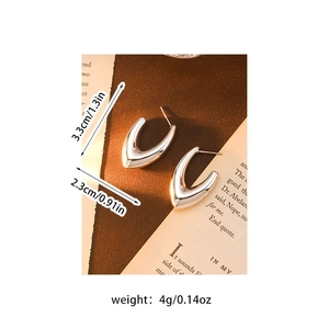 Detail view of silver V-shaped metallic earrings with size and weight dimensions