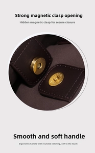 Detail of premium brown leather bag showing hidden magnetic gold buckle and fine stitching