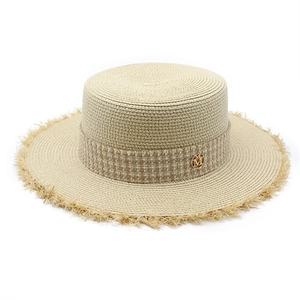 Flat top raffia boater hat with plaid ribbon, fringe brim and gold metal M detail