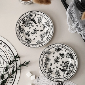 French vintage ceramic plate with retro floral butterfly sketches and elegant border text