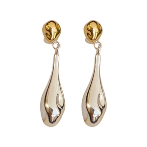 Minimalist gold and silver teardrop earrings featuring a sleek metallic dangle design