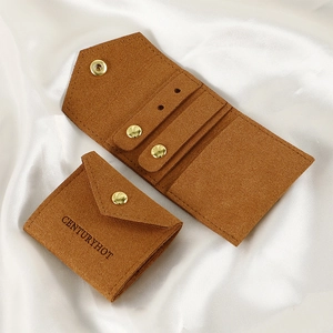 Caramel microfibre jewelry roll pouch with gold snap button and earring organizer