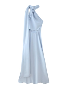 Detail of light blue satin halter dress featuring an elegant side drape and open back