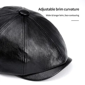 Classic black faux leather newsboy cap with textured finish and foldable wide brim
