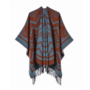 Winter geometric shawl in brick red and blue-grey with black fringe tassels