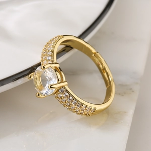 Elegant gold-plated open ring with large round zircon and paved side diamonds