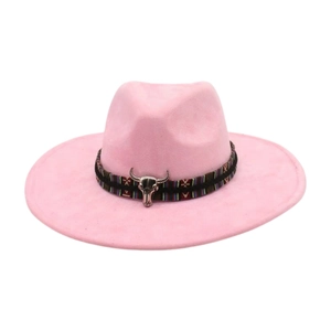 Close-up of pink fedora hat with ethnic woven band and silver bull head decoration