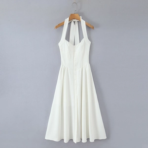 Elegant white halter neck midi dress featuring a button-front design and A-line silhouette