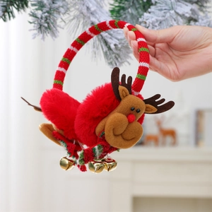 Close-up of reindeer Christmas earmuffs with bells held against a cozy festive background