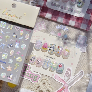 Detail of cute cat and summer coconut tree embossed nail art stickers with 3D accents