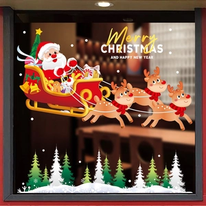 Detailed Christmas window stickers with Santa, reindeer, and snowflakes on glass