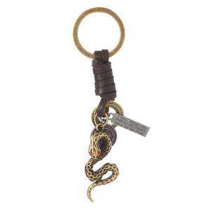Vintage bronze snake keychain with leather cord and engraved poetic metal tag