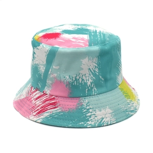 Detail of colorful abstract graffiti print on double-sided sun bucket hat for women and men