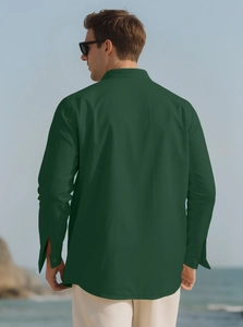 Detail view showing back and sleeve of dark green men linen casual long sleeve shirt