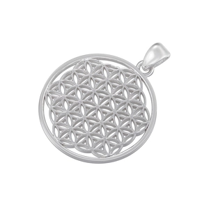 Macro detail of a silver Tree of Life pendant with intricate hollow circular patterns