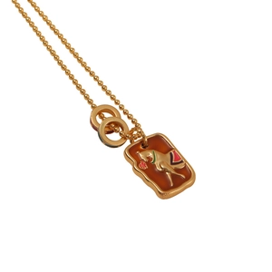 Vintage gold necklace with rectangular enamel pendant and horse relief on bead chain