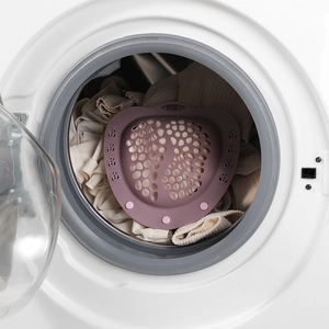 Purple silicone laundry filter bag for hair removal in washing machine drum