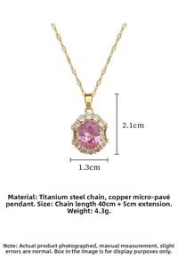 Detailed view of titanium steel gold necklace with pink oval zircon and halo diamonds