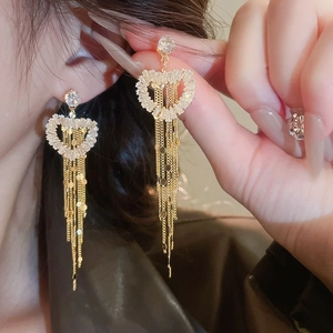 Elegant gold plated heart tassel earrings with sparkling white cubic zirconia insets
