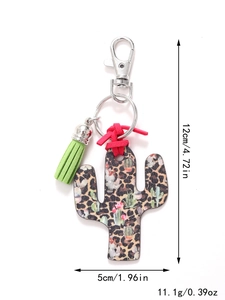 Leopard print cactus keychain detail with green tassel and dimensions 12cm by 5cm