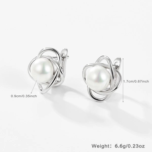 Detail of 925 sterling silver pearl earrings with swirl design and size measurements