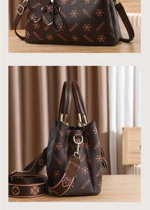 Macro detail of brown textured leather bucket bag with floral print and gold hardware