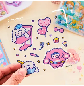 Close-up of cute waterproof PET cartoon stickers with various pink heart and dog patterns