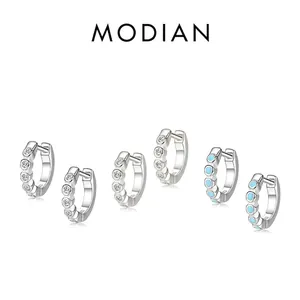 Three pairs of small S925 sterling silver hoop earrings with clear and blue crystals