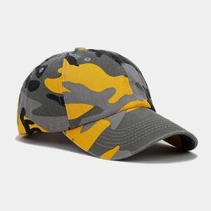 Close-up of camouflage baseball cap showing cotton twill texture and stitching detail