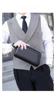 Men's black lychee pattern leather clutch bag with a wrist strap for business style
