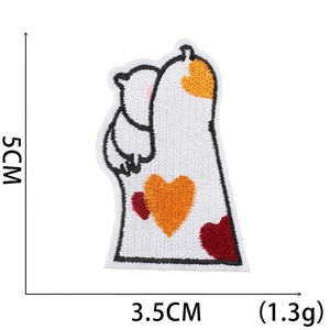 Detailed view of cat embroidery patch with 5cm x 3.5cm size markings and stitch texture