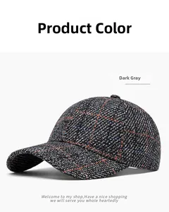 Close-up of deep gray tweed baseball cap with orange and blue plaid weave details