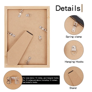 Detail of wooden certificate frame back with metal spring clips and hanging hooks