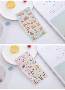Detail of cute fox and panda stickers for scrapbooking in a cozy lifestyle setting