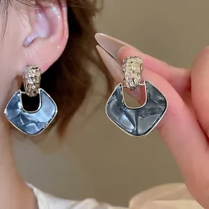 Modern acrylic pleated diamond earrings with vintage silver hammer texture accents