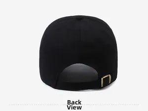 Adjustable back view of black cotton baseball cap with bronze metal buckle closure