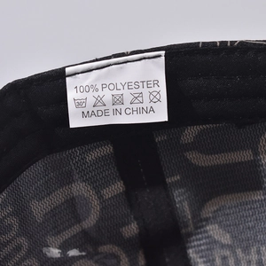 Detail shot of internal label showing 100% polyester fabric and washing instructions
