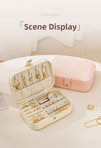 Internal view of travel jewelry box sections for rings, necklaces and watch storage