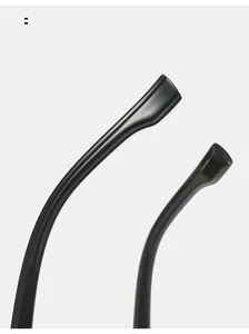Close-up of sleek curved mirror legs on oversized fashion sunglasses with glossy finish
